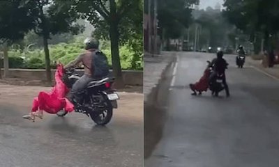 ಯುವತಿಯನ್ನು ಚಲಿಸುವ ಬೈಕ್ ನಲ್ಲಿ ಎಳೆದೊಯ್ದ ಪ್ರಿಯತಮ: ನೆಟ್ಟಿಗರು ಕಿಡಿ