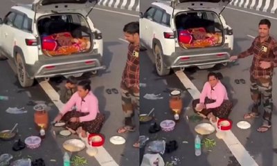 ರಸ್ತೆ ಮಧ್ಯೆ ಅಡುಗೆ ಮಾಡಿದ ಮಹಿಳೆ: ನೆಟ್ಟಿಗರು ಹೇಳಿದ್ದೇನು?