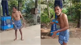 ಅಮಲಿನಲ್ಲಿ ಹಾವನ್ನು ಕುತ್ತಿಗೆಗೆ ಸುತ್ತಿಕೊಂಡ ಕುಡುಕ