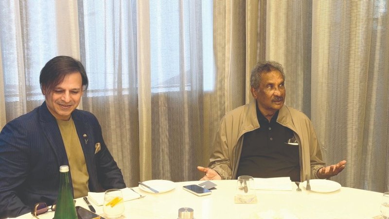 K.J. George with Vivek