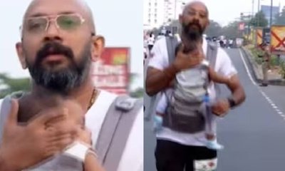 ಮಗುವನ್ನು ಕಟ್ಟಿಕೊಂಡು ಮ್ಯಾರಾಥಾನ್ ಓಡಿದ ತಂದೆ; ನೆಟ್ಟಿಗರಿಂದ ಆಕ್ರೋಶ!