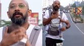 ಮಗುವನ್ನು ಕಟ್ಟಿಕೊಂಡು ಮ್ಯಾರಾಥಾನ್ ಓಡಿದ ತಂದೆ; ನೆಟ್ಟಿಗರಿಂದ ಆಕ್ರೋಶ!