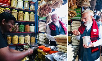 ಬಂಗಾಳದ ರಸ್ತೆ ಬದಿ ಮಂಡಕ್ಕಿ ಸವಿದ ಪ್ರಧಾನಿ ಮೋದಿ!