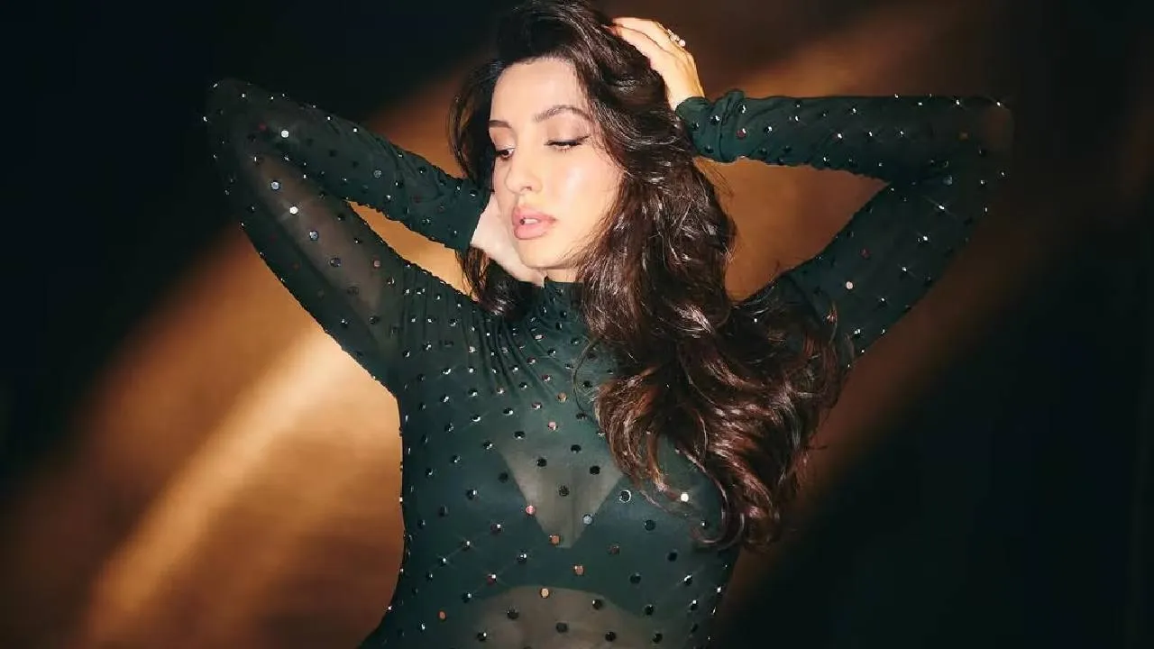 Nora Fatehi: ನೋರಾ ಫತೇಹಿ ಸೆಕ್ಸಿ ಲುಕ್‌ ಕಂಡು 'ಅಬ್ಬಬ್ಬಾ' ಎಂದ್ರು ಫ್ಯಾನ್ಸ್​ - Image 3