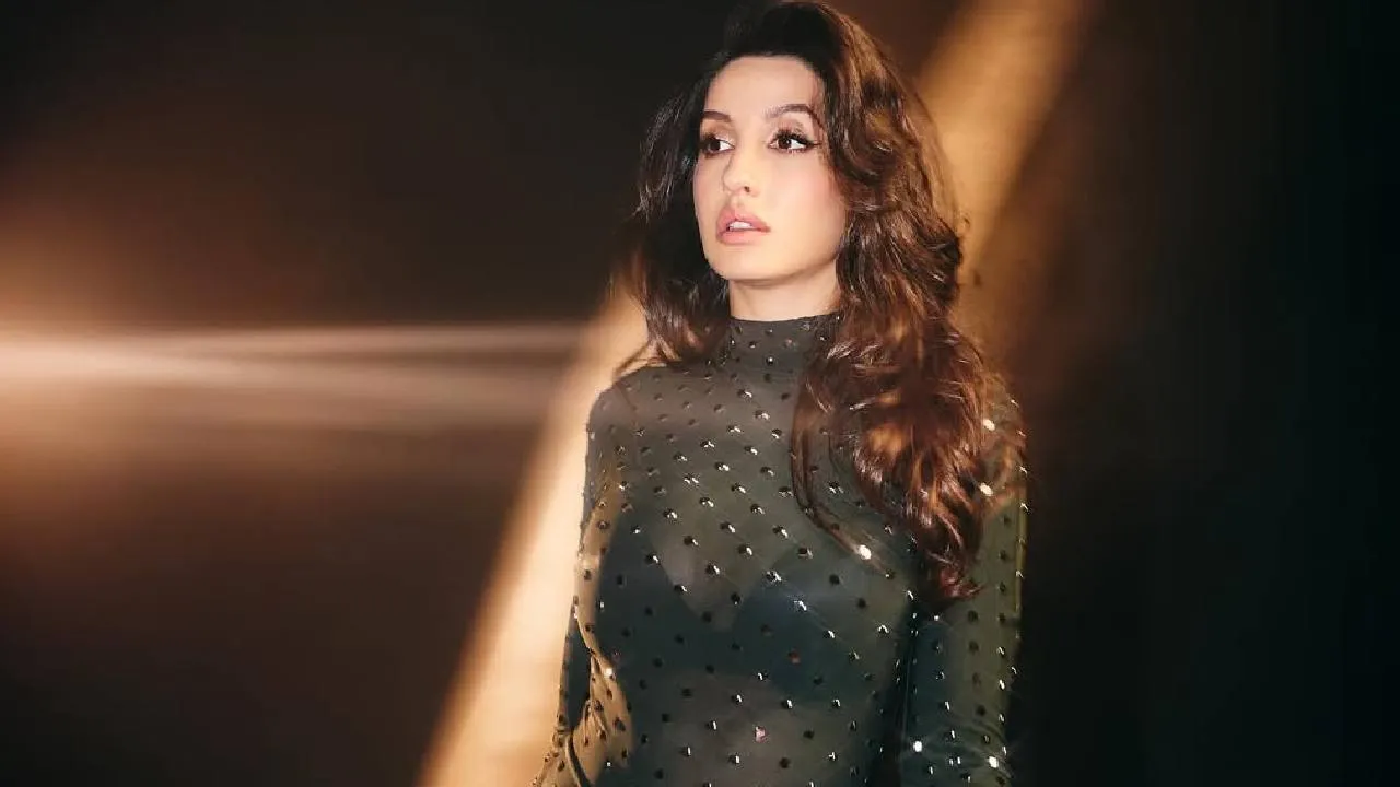 Nora Fatehi: ನೋರಾ ಫತೇಹಿ ಸೆಕ್ಸಿ ಲುಕ್‌ ಕಂಡು 'ಅಬ್ಬಬ್ಬಾ' ಎಂದ್ರು ಫ್ಯಾನ್ಸ್​ - Image 1