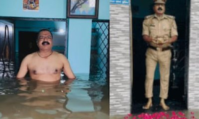 ಜಲಾವೃತಗೊಂಡಿರುವ ಮನೆ ಬಾಗಿಲಲ್ಲಿ ನಿಂತು ಗಂಗಾರತಿ ಮಾಡಿದ ಪೊಲೀಸ್‌