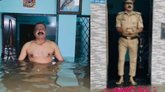 ಜಲಾವೃತಗೊಂಡಿರುವ ಮನೆ ಬಾಗಿಲಲ್ಲಿ ನಿಂತು ಗಂಗಾರತಿ ಮಾಡಿದ ಪೊಲೀಸ್‌