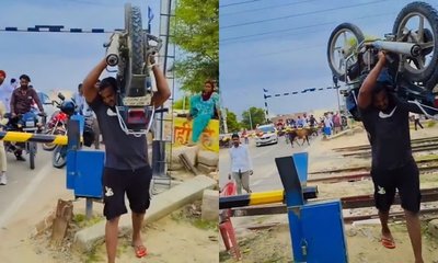 ಹೆಗಲ ಮೇಲೆ ಬೈಕ್ ಹೊತ್ತ ವ್ಯಕ್ತಿ; ಬಾಹುಬಲಿ ಎಂದ ನೆಟ್ಟಿಗರು
