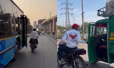 ಚಲಿಸುವ ಬಸ್, ಕಾರಿನ ಬಾಗಿಲು‌ ತೆರೆದ ಯುವಕ: ವಿಡಿಯೊ ಇಲ್ಲಿದೆ