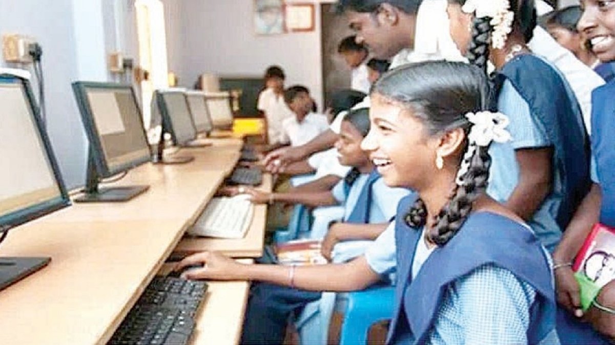 student with computer
