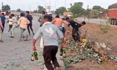 ಮದ್ಯದ ಟ್ರಕ್‍ ಬಿದ್ದಿದ್ದು ನೋಡಿ ಜನ ಹೀಗಾ ಮಾಡೋದು