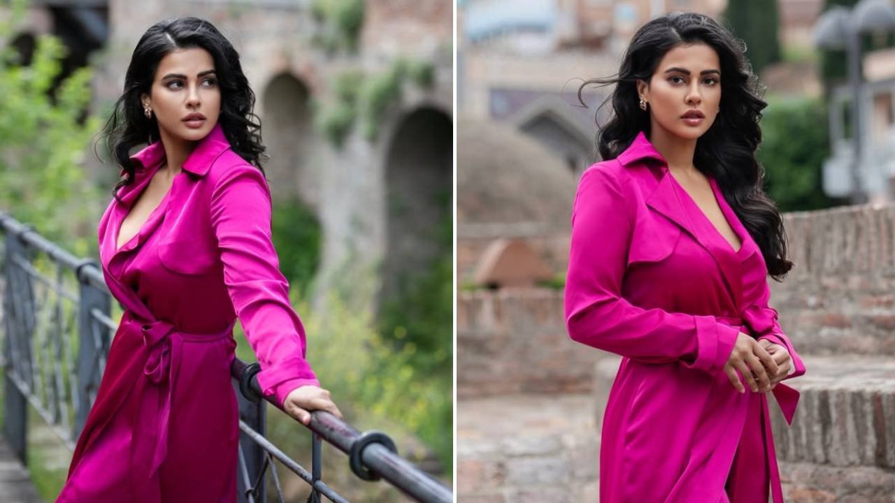 Star Fashion 2025: ವೈಬ್ರೆಂಟ್ ಟ್ರೆಂಚ್ ಕೋಟ್ ಡ್ರೆಸ್ನಲ್ಲಿ ನಟಿ ಶರ್ಮಿಳಾ ಮಾಂಡ್ರೆಯ ಟ್ರಾವೆಲ್ ಫ್ಯಾಷನ್ - Image 1
